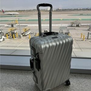 TUMI | international 19 degree aluminum carry-on silver